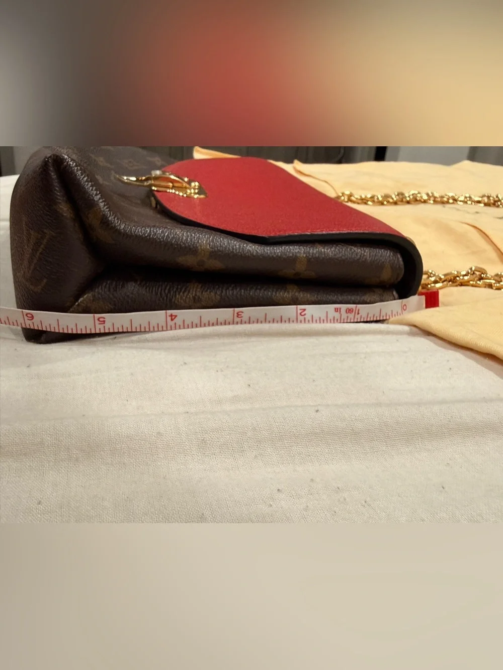 Louis Vuitton Saint Placide brown monogram with red trim